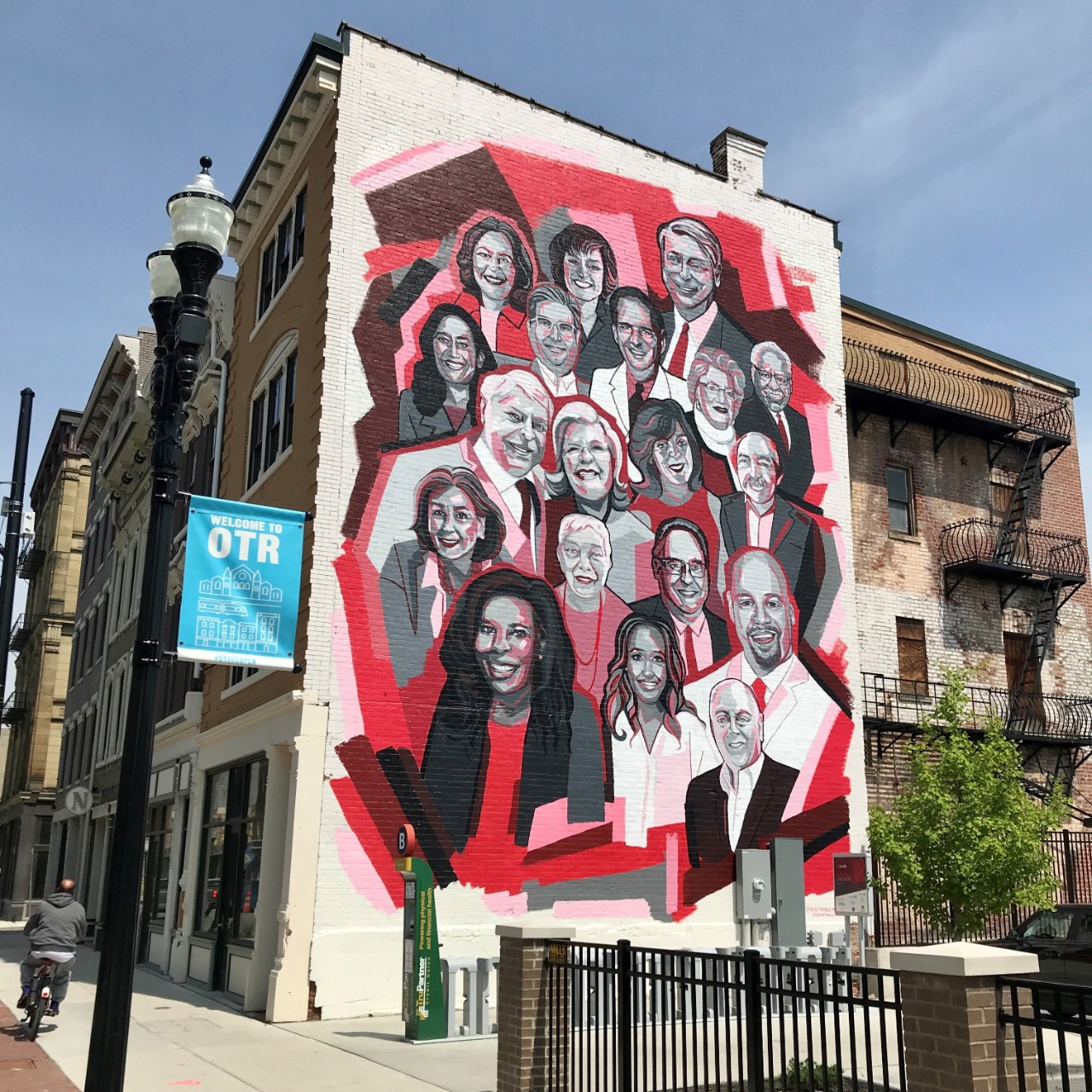 Mural of UC alumni portraits
