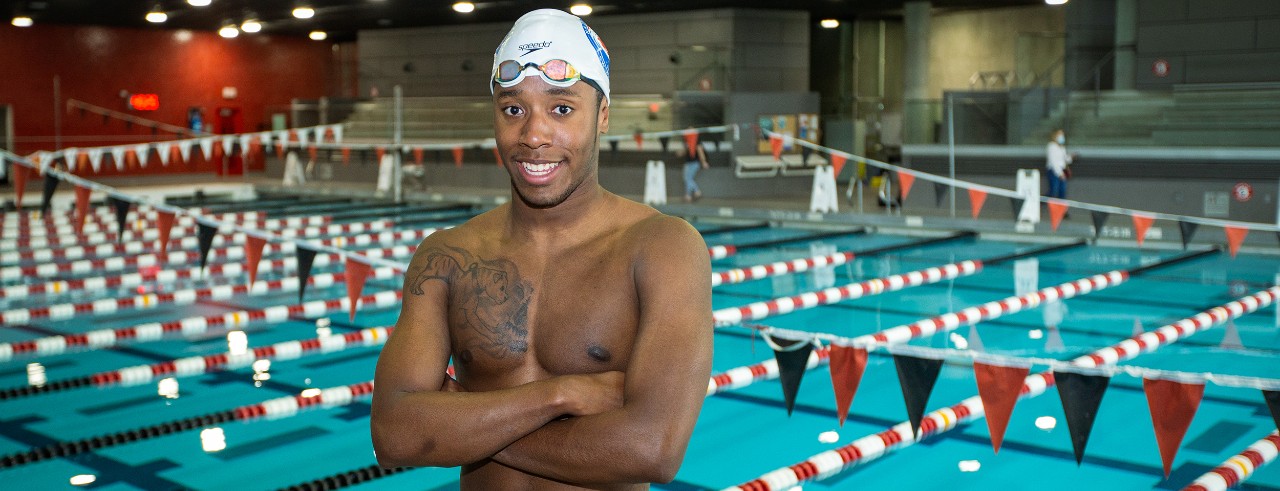 Lawrence Sapp poses by pool
