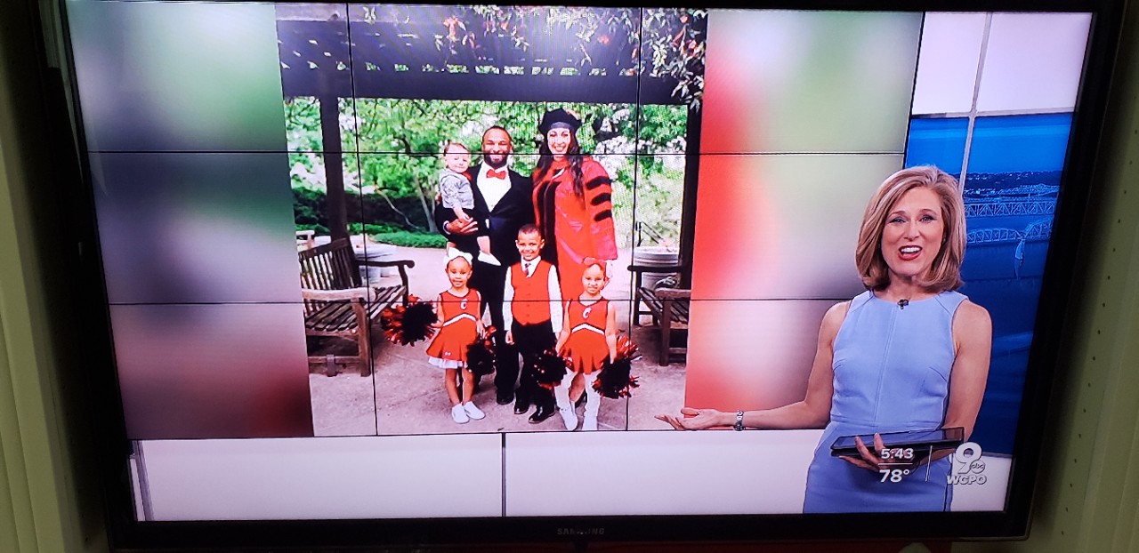 image of WCPO journalist Kristyn Hartman with family of Hagar Elgendy in the background