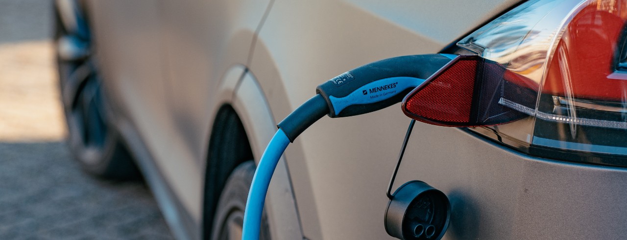 an electric charger charging an electric vehicle