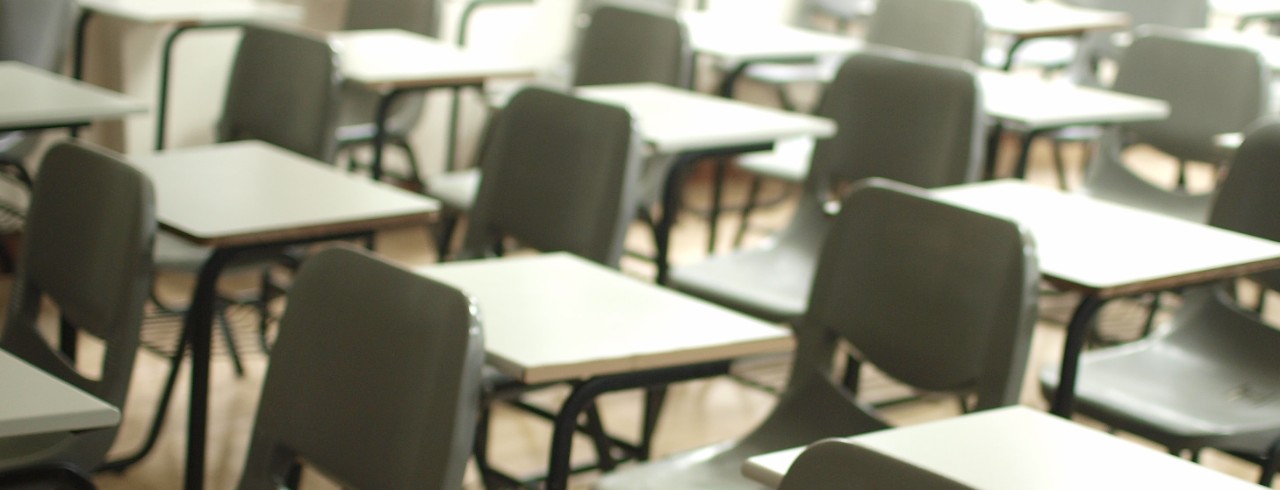 empty classroom with desks