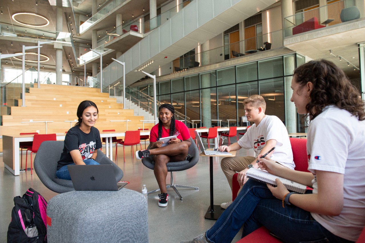 Students in Health Sciences Building atrium 