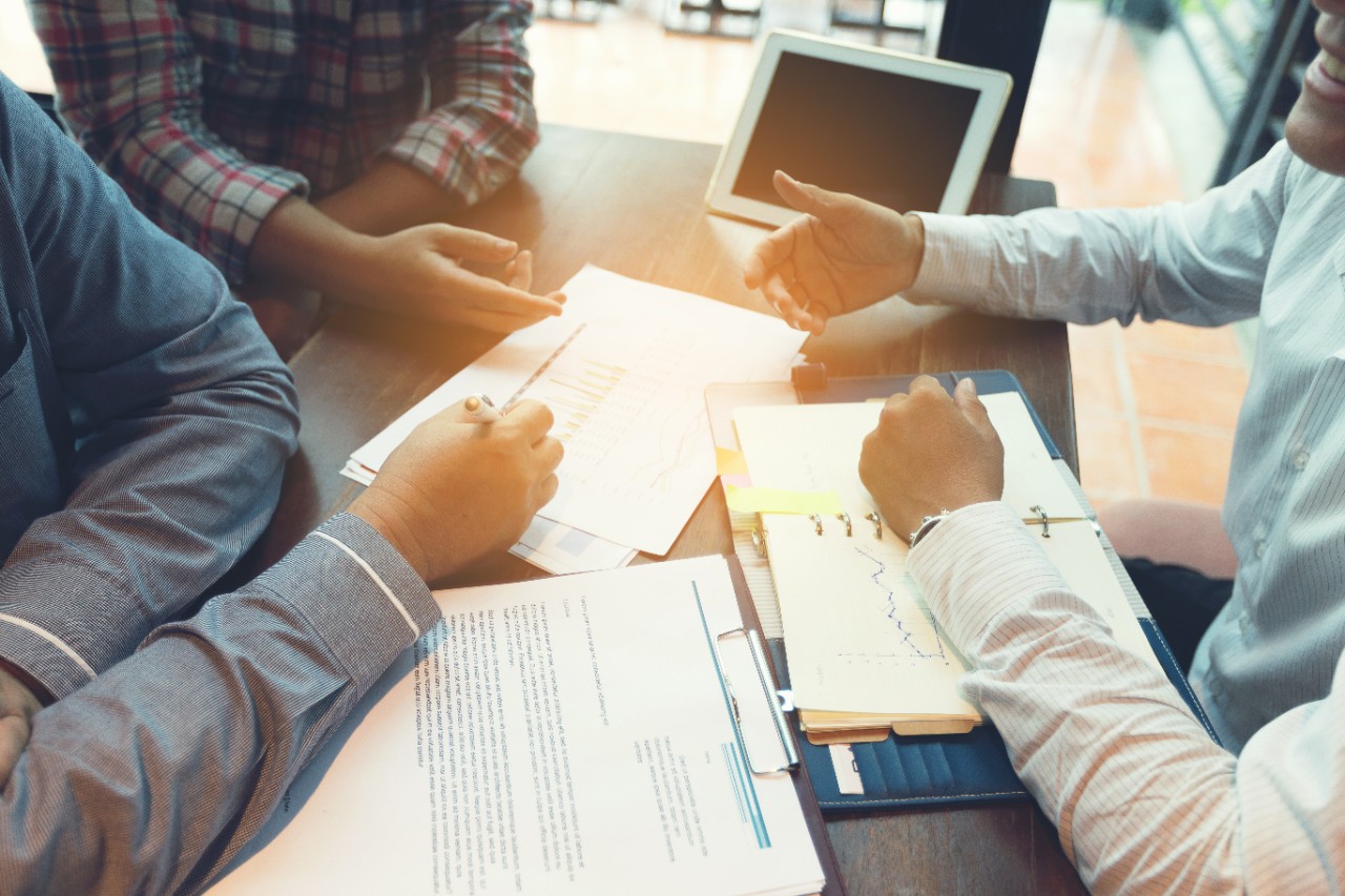 Team businessmen are discussing or negotiating business channels.Business solution or business consultancy; Concept