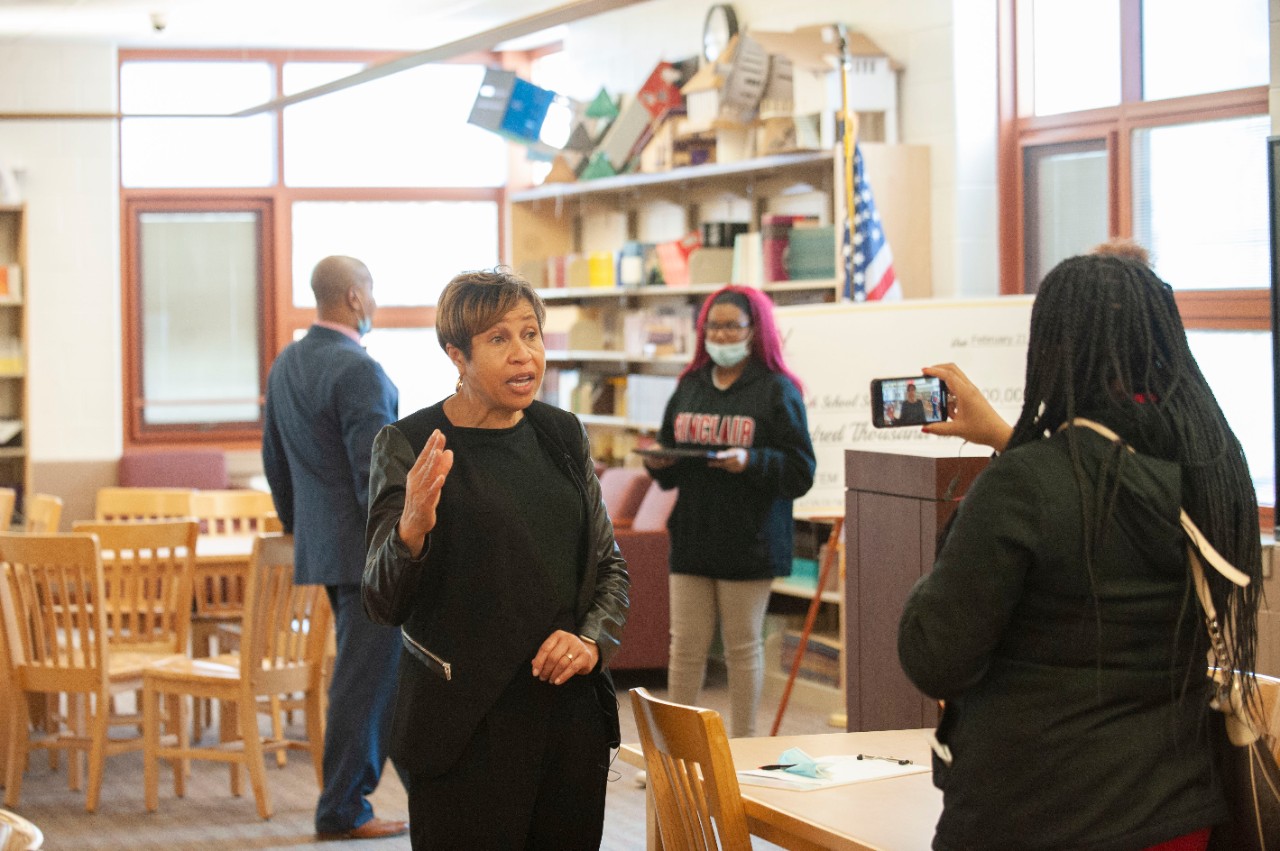 Jack Miner, Vice Provost for Enrollment Management surprised Ke’Ayra Rogers future UC Bearcats with Marian Spencer Scholarship award at Aiken High School Tuesday February 1, 2022. Marian Spencer Scholarship award students with full tuition, room and board and an all-expenses-paid study abroad experience from the University of Cincinnati. Photos by Joseph Fuqua II