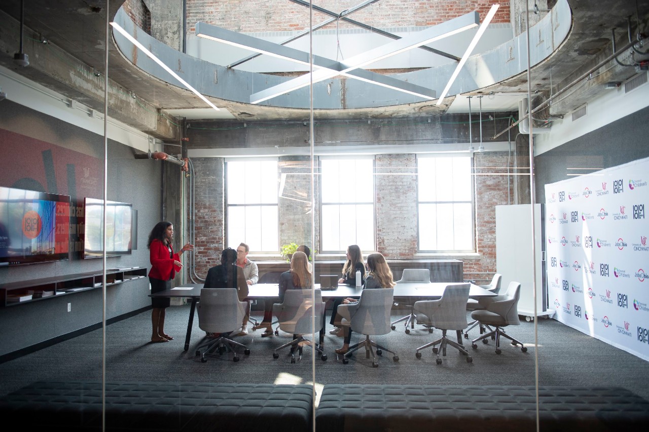 Group at a table in 1819 meeting room