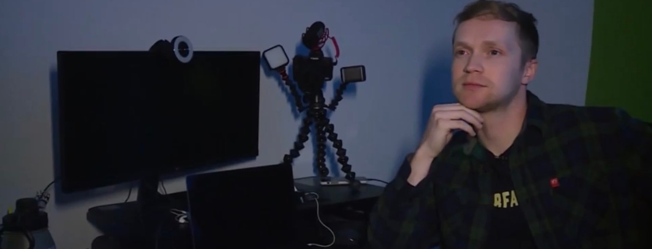 John Eringman is interviewed by a television crew.