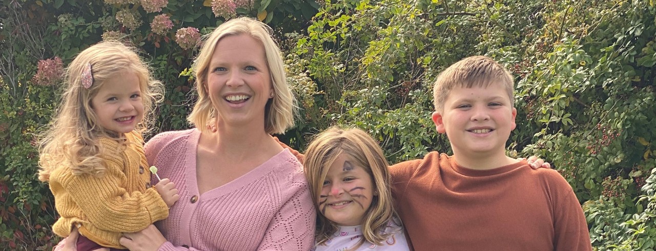 Sarah Pineda outside with her three children