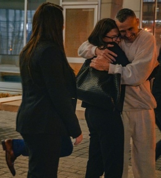 Alan Butts is surrounded by friends and family. 