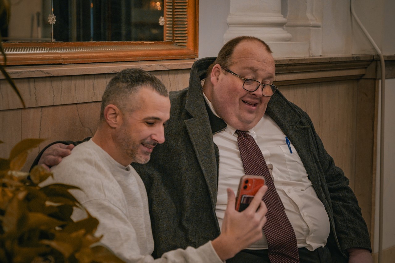 OIP attorney and professor Donald Caster shares a moment with Alan Butts.