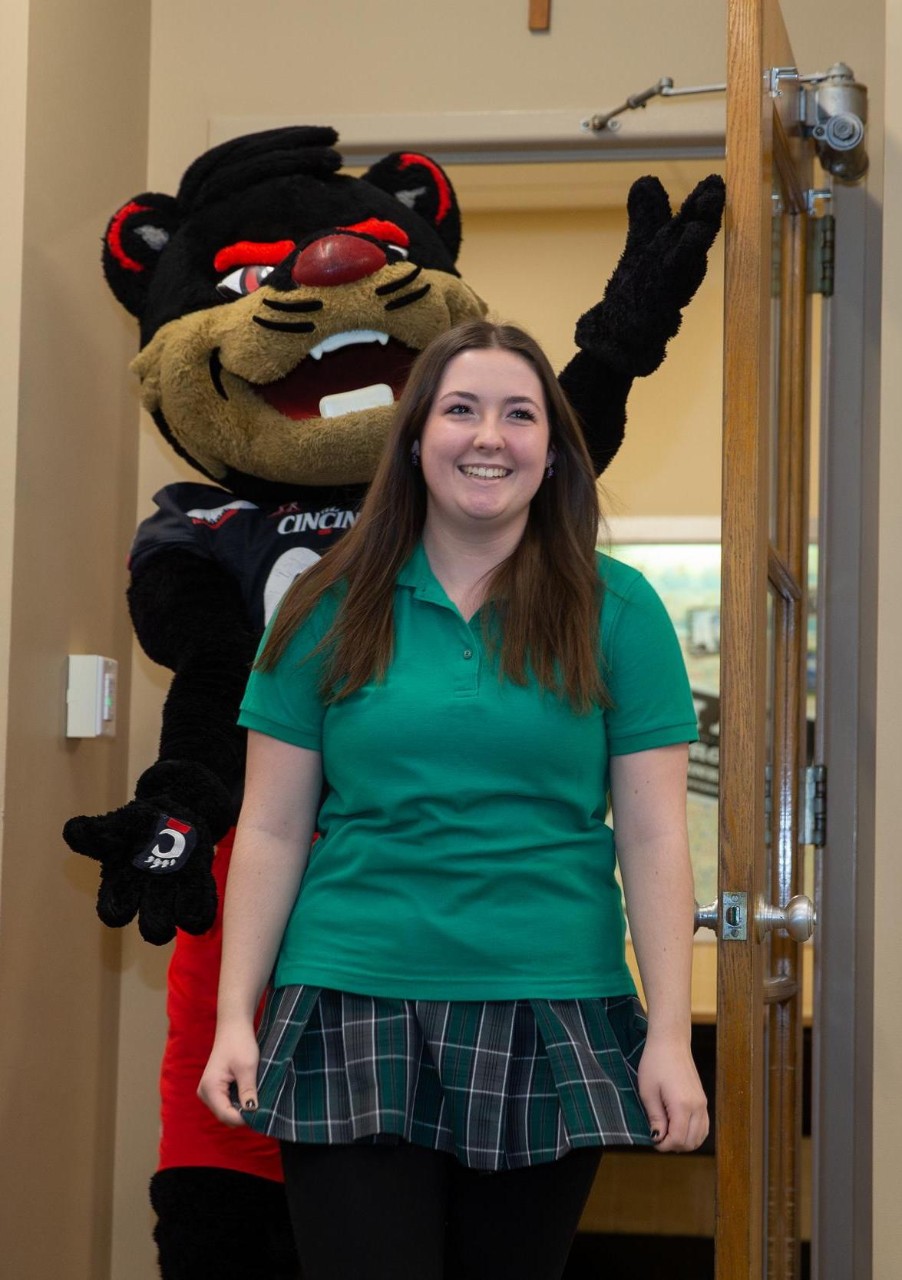 High school student Anna Horgan with Bearcat mascot