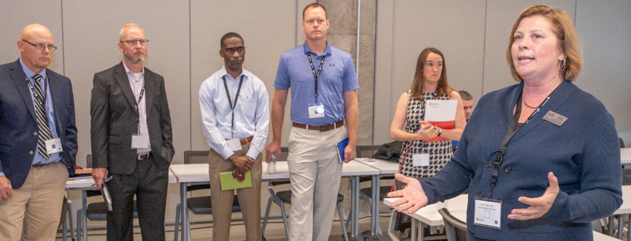 Rebekah Michael speaks during a training exercise hosted by the Ohio Cyber Range Institute at the University of Cincinnati.