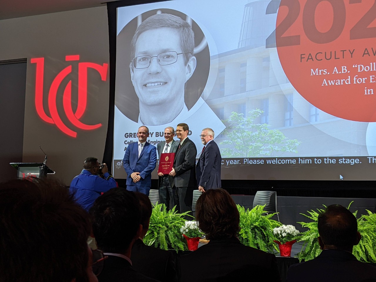 Gregory Bucks receiving award 