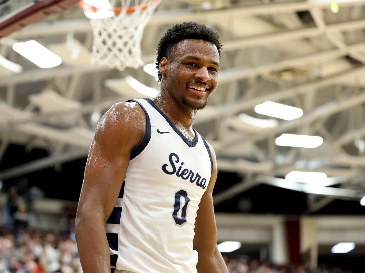 a photo of a basketball player on the court