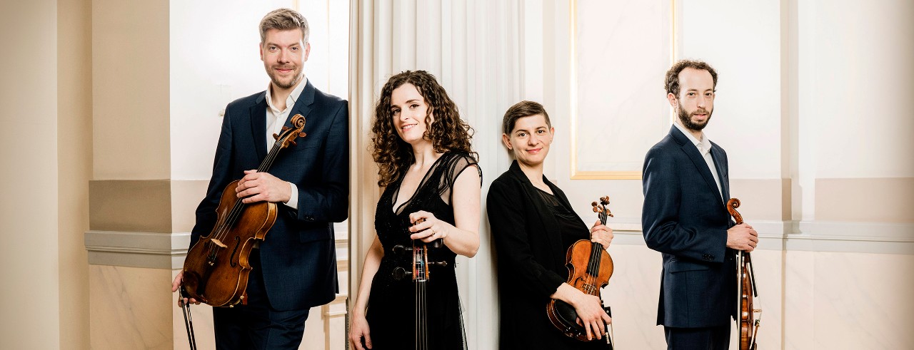 Members of the Ariel Quartet pose with their instruments