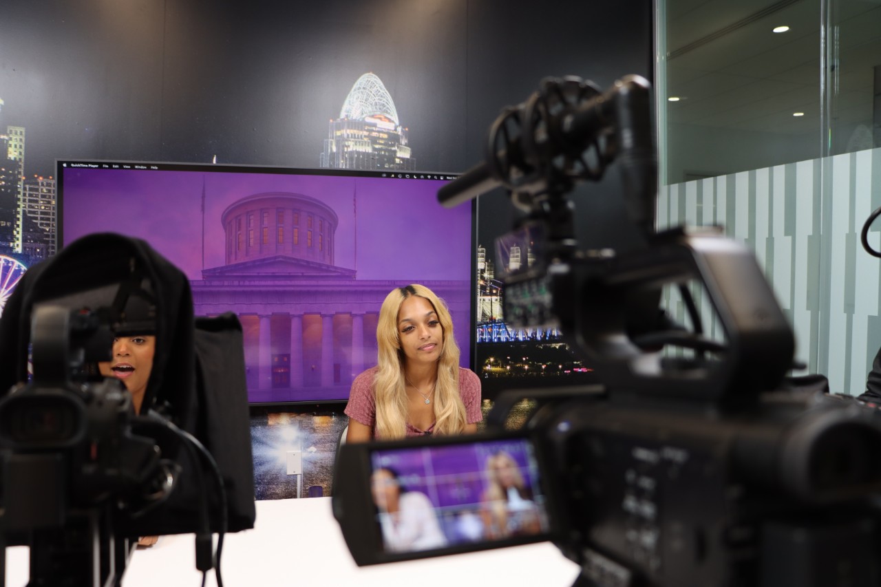 Students training in UC Journalism's new TV studio.