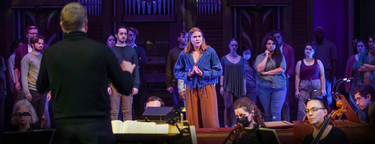 CCM Choral Studies performs on stage