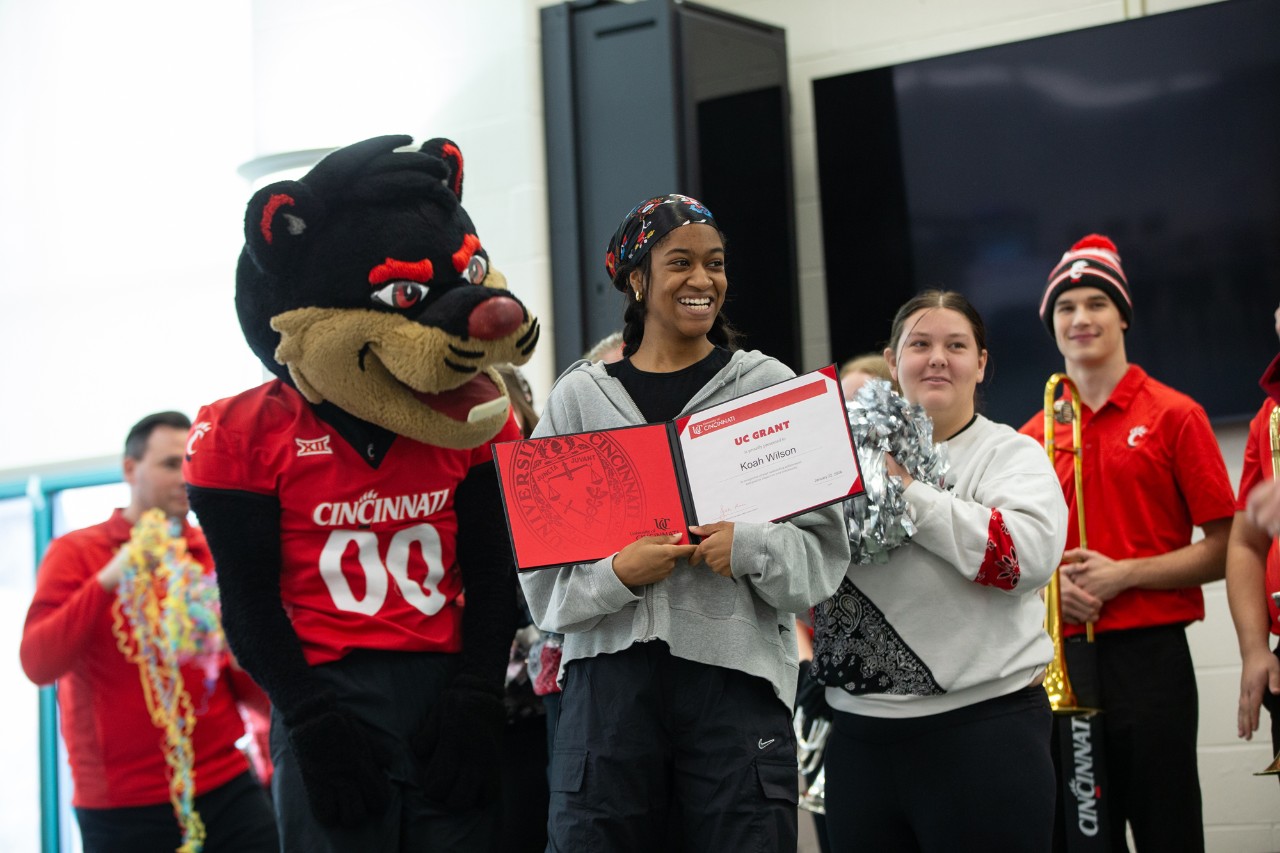 UC surprises Koah Wilson at William Mason High School on Decision Day.