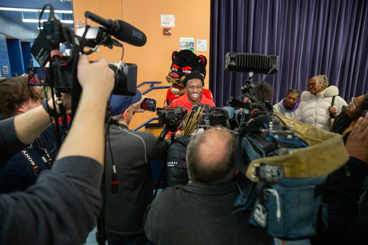 UC surprises Marian Spencer Scholar Zamir Frazier at Riverview East Academy on Decision Day.
