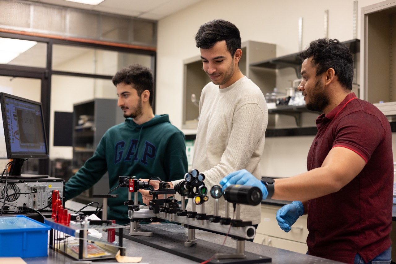Students in Kishan Bellur's lab work in research