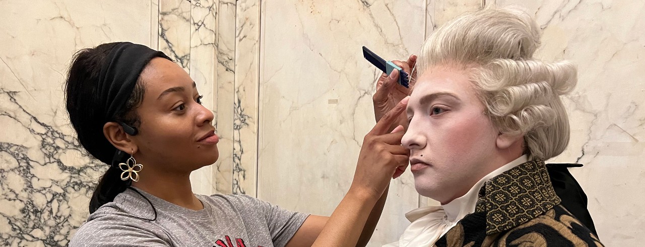 Tiara Jones working on make-up and wig design. Photo/Provided.