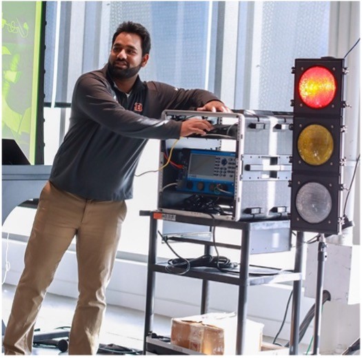 Sai Bonthu pictured next to a traffic light 