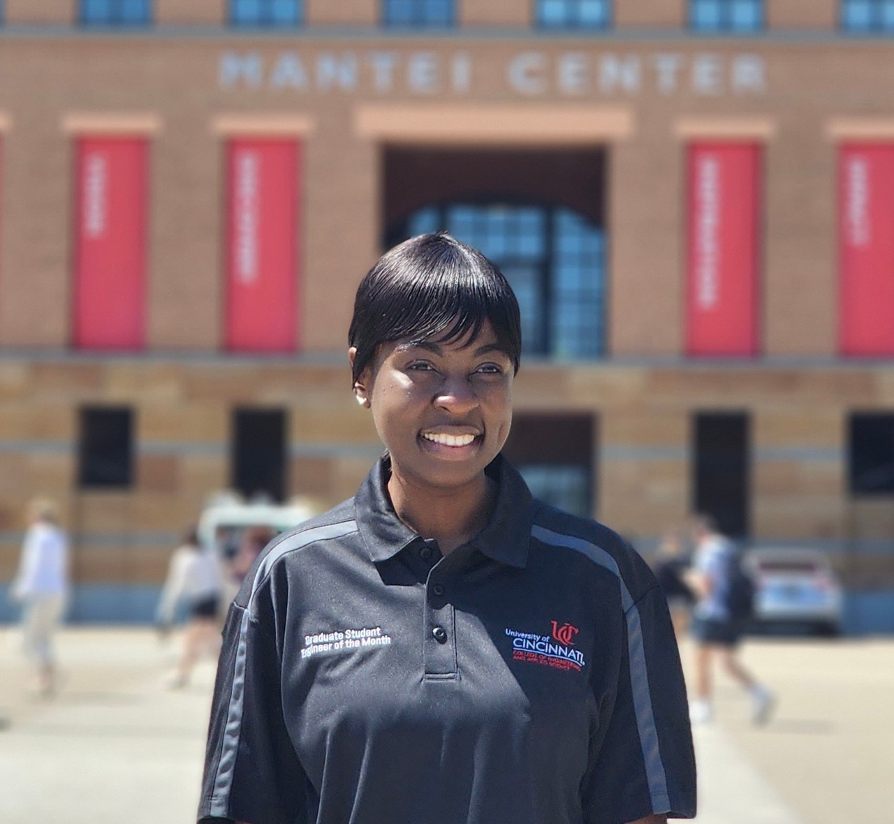 Tolulope Odunola stands in front of Mantei Center