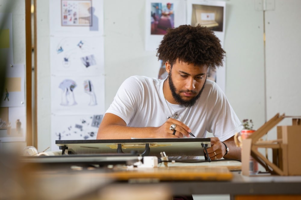 Jerrell Francisco working on a creative project.