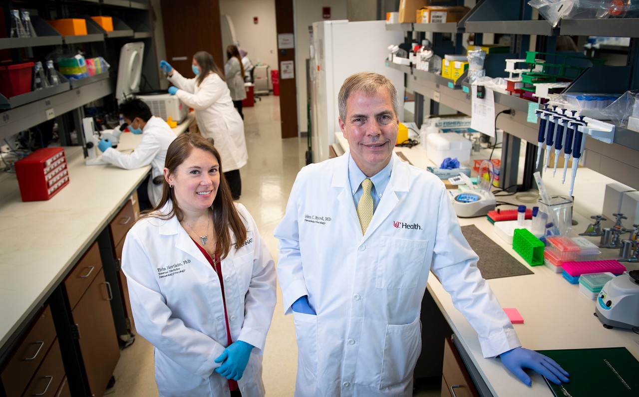 John C. Byrd, MD, in lab with his research team.
