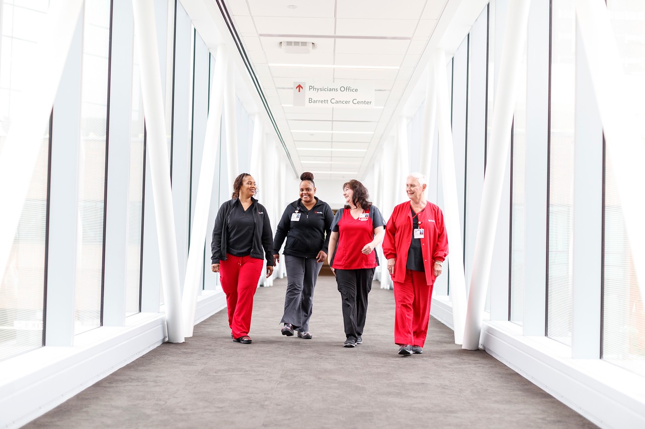 Staff walking through the hallway at UCGNI.