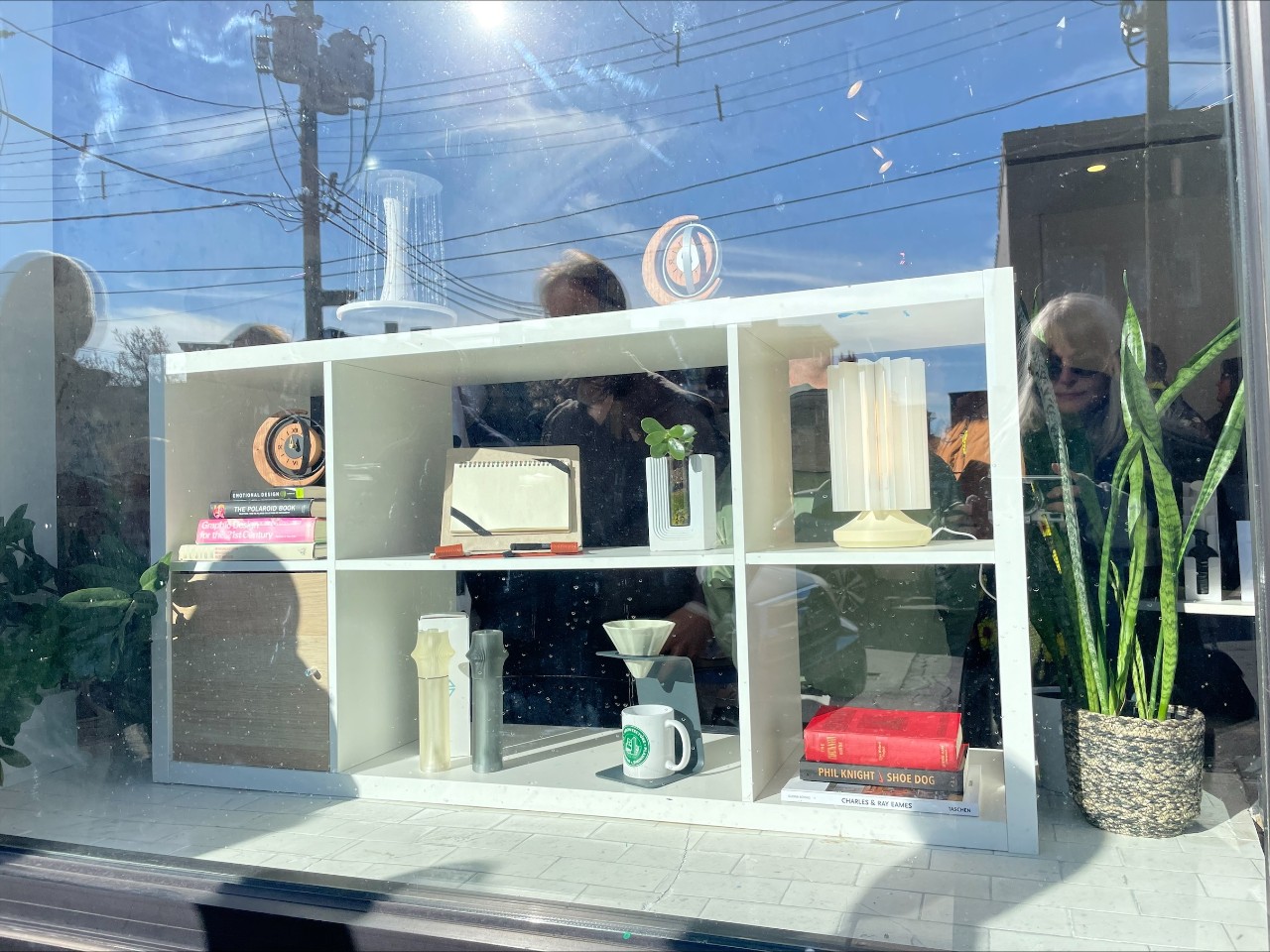 Student made items arranged in the window display.