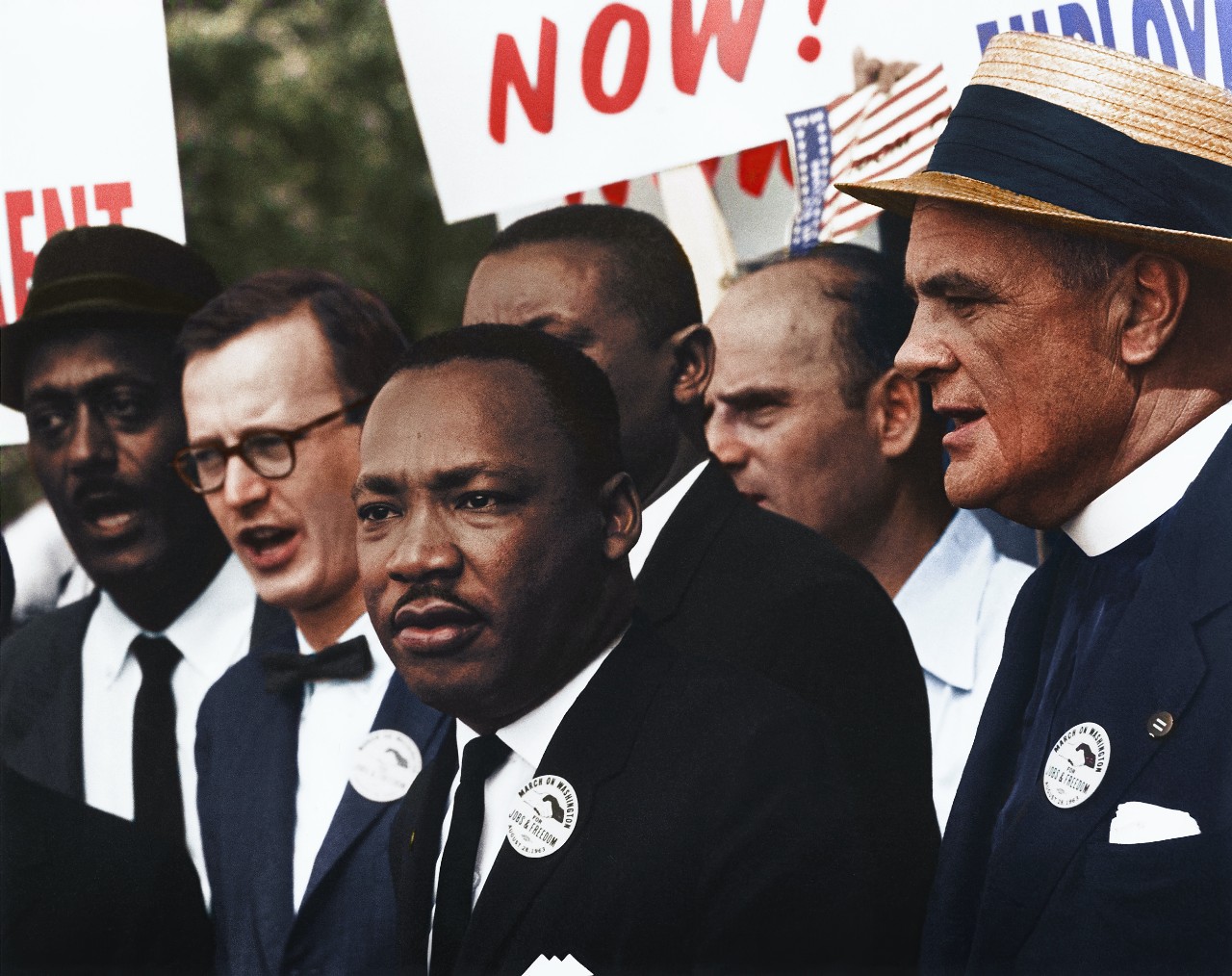 Several men with Martin Luther King Jr. in foreground at a march.