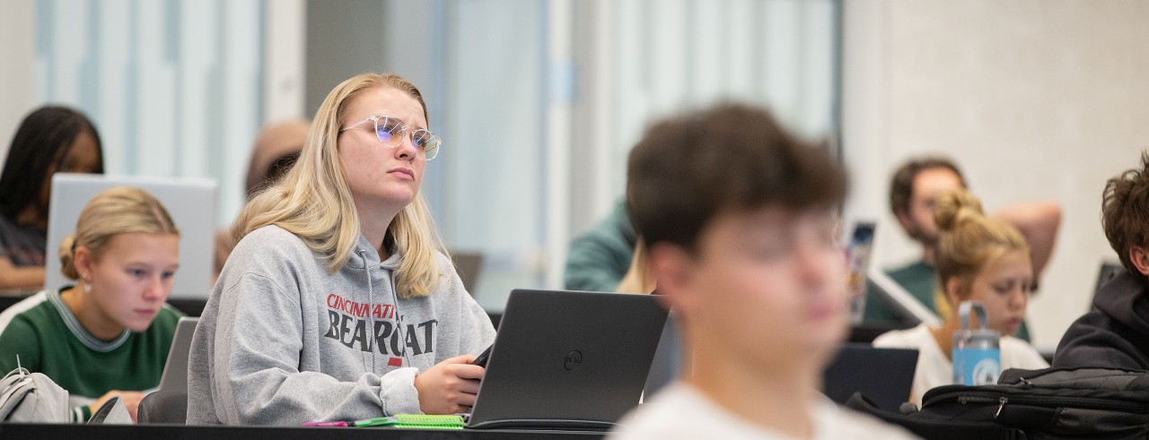 students sit in classroom