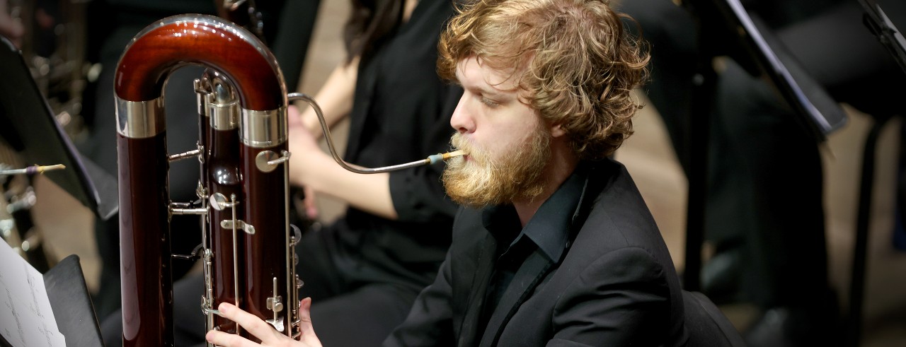 CCM Wind Symphony performs on stage