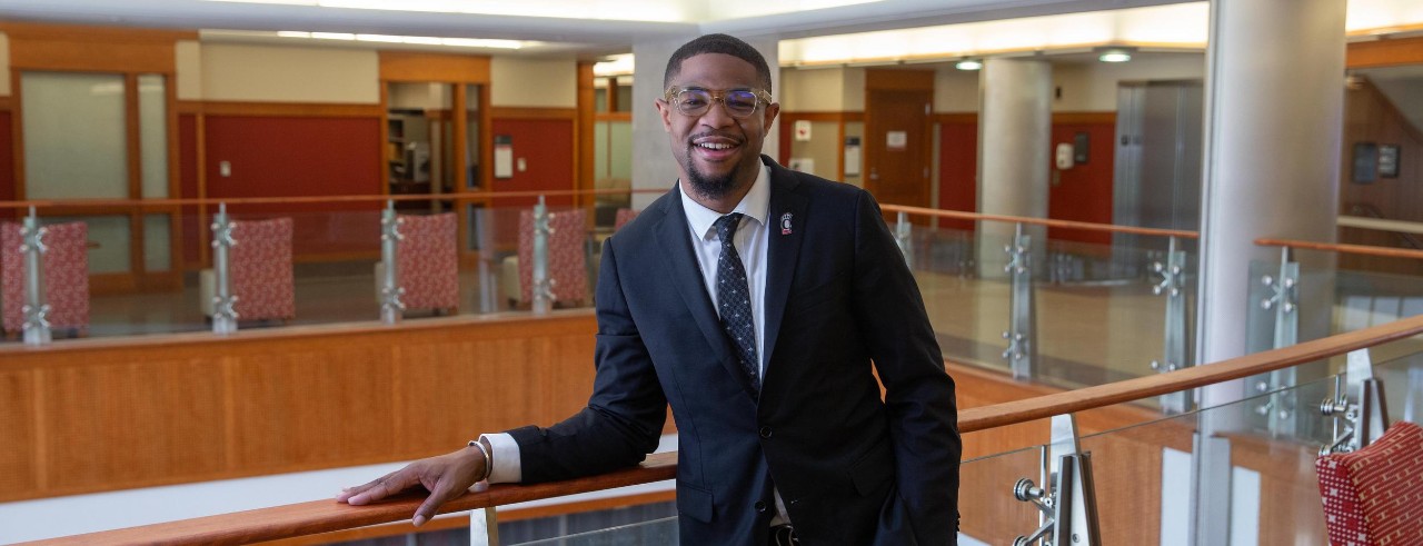 Criminologist J.Z. Bennett on the stairs of the Teachers Dyers building