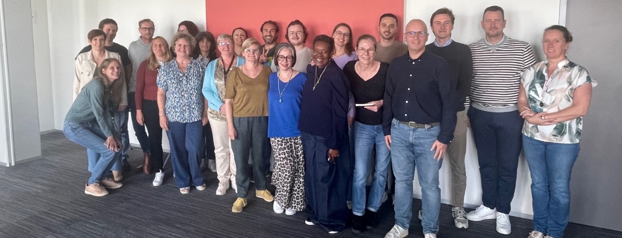 group of people posing for a photo