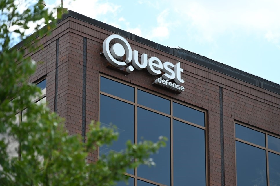Quest Defense building logo