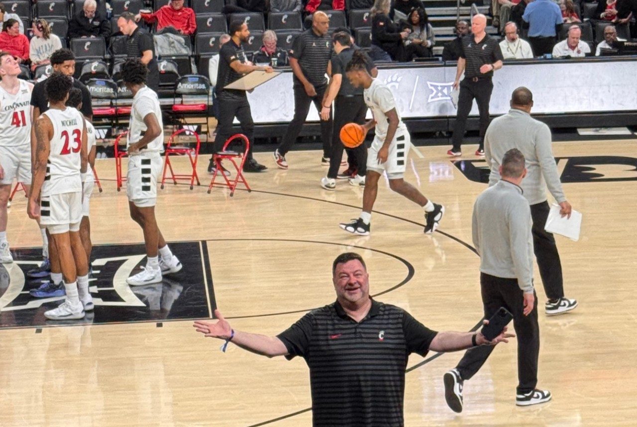 Chris Peltier on UC basketball court