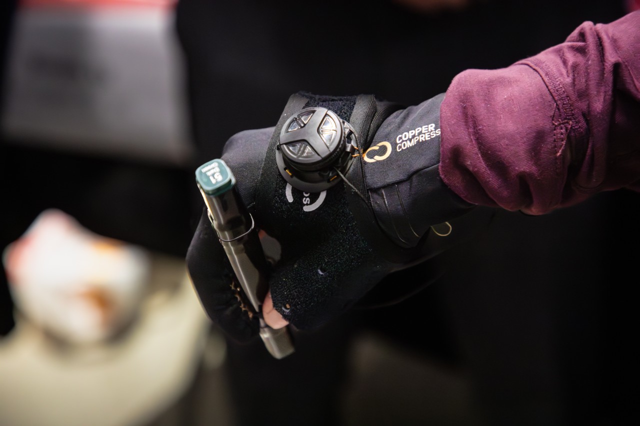 Rozales using the grip strength assistive glove