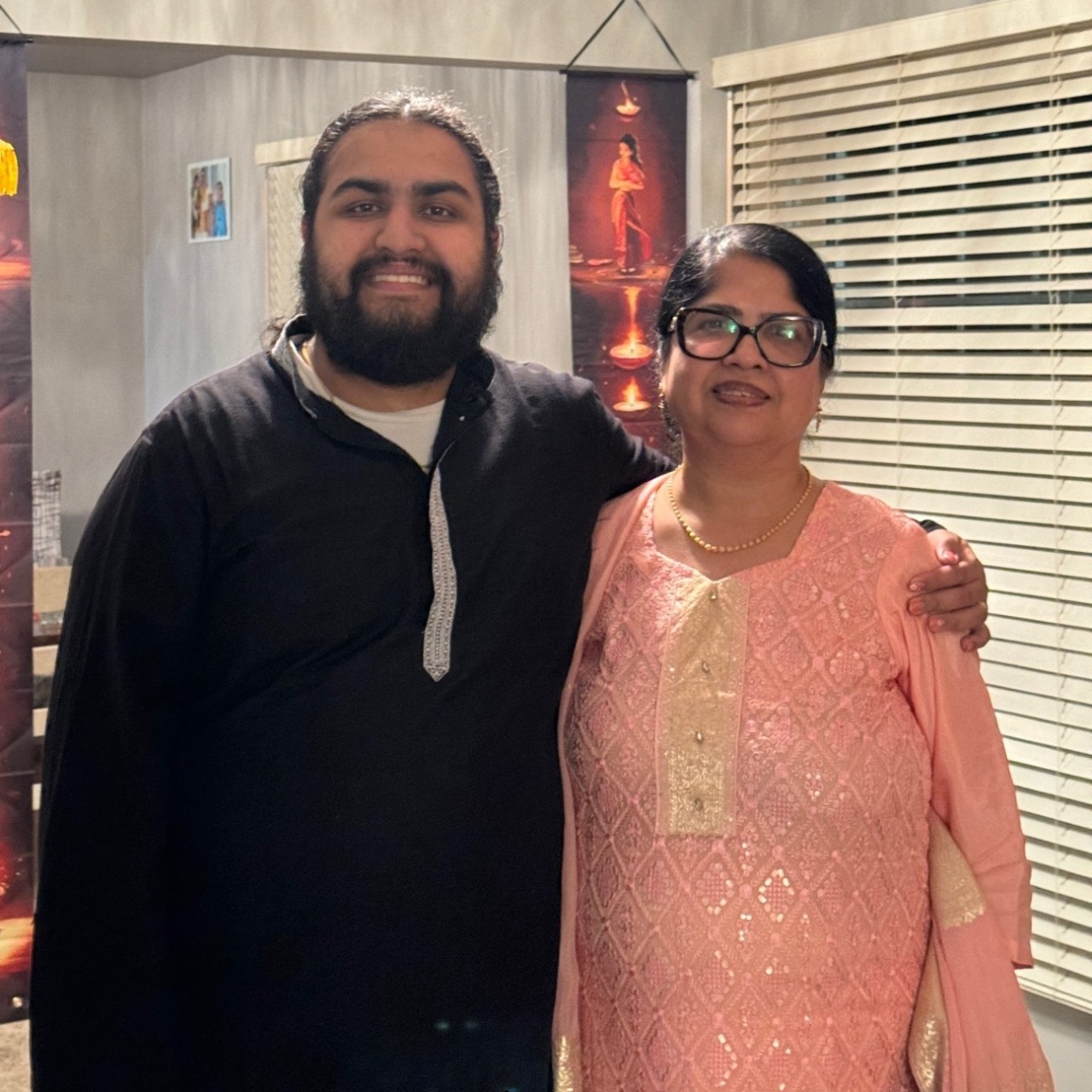 Harshman Sihra poses with his mother.