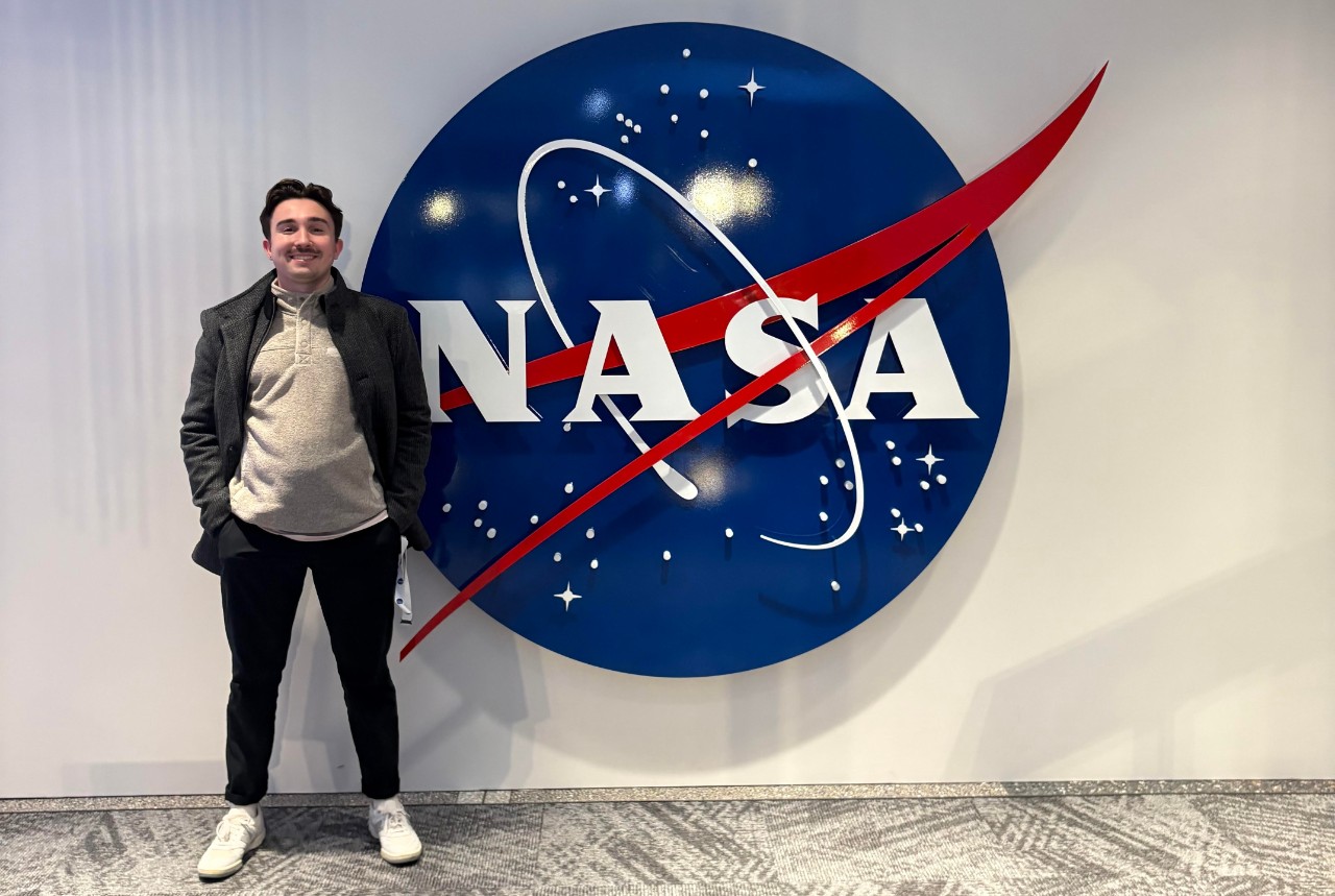 Colin Malott  at the NASA sign