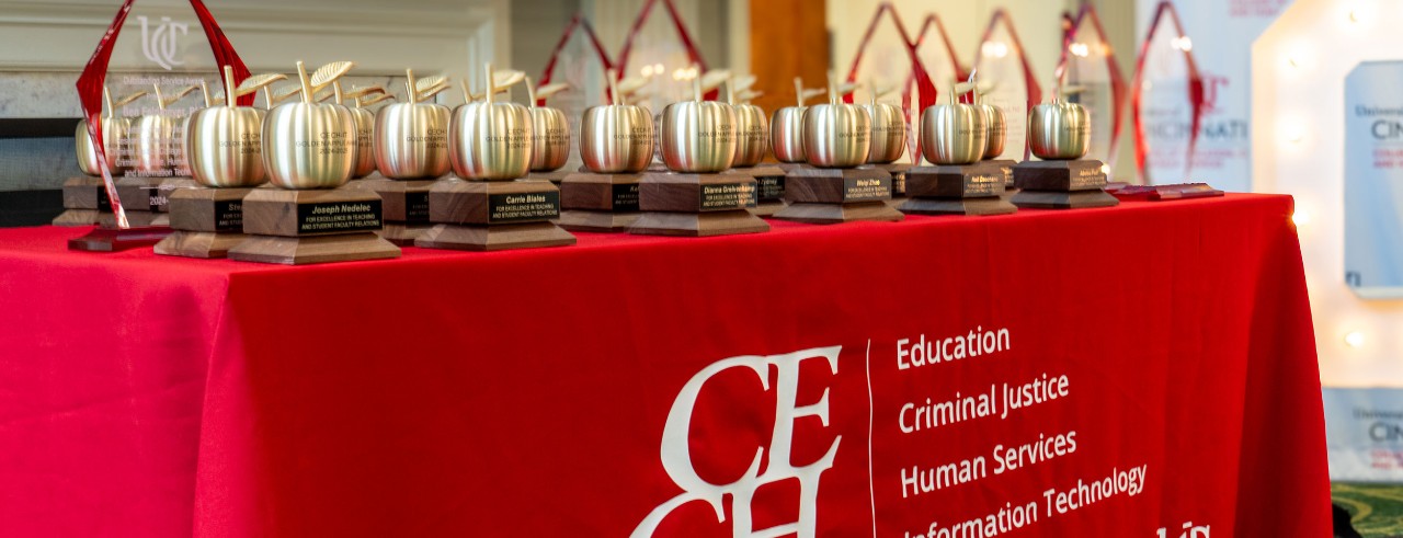 various awards on a table at an event