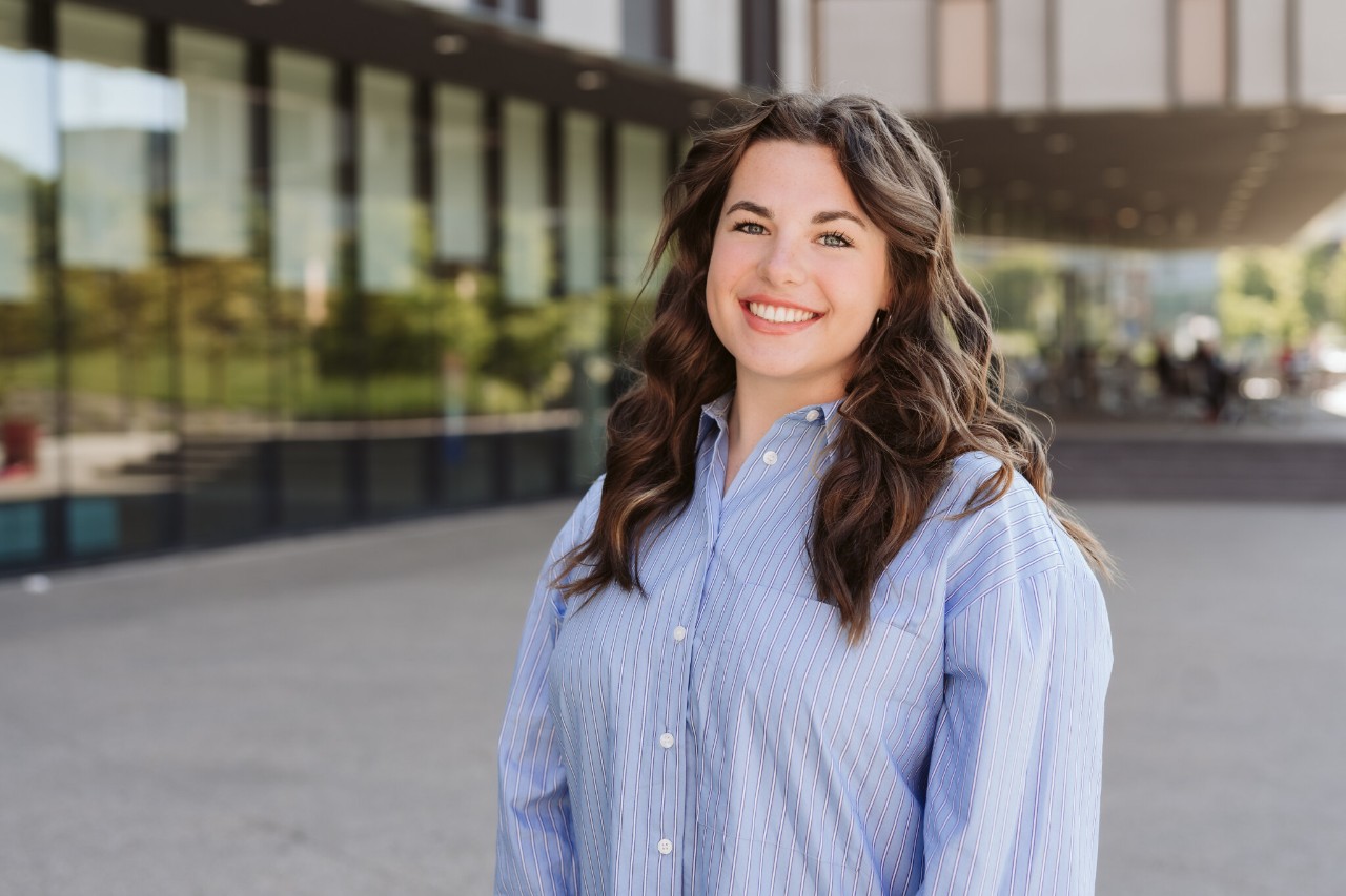 Charlie Harker wearing blue shirt