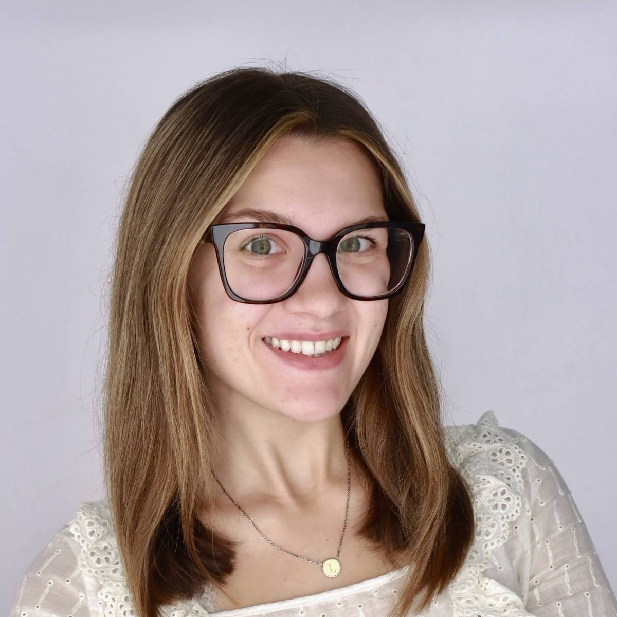 portrait of a young woman with glasses
