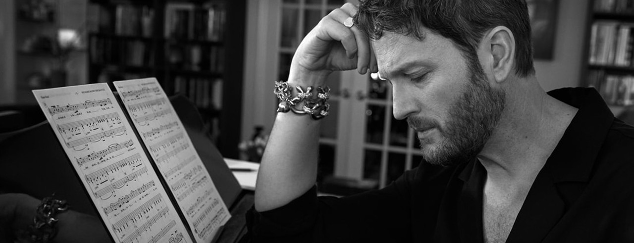 Todd Almond works at a piano