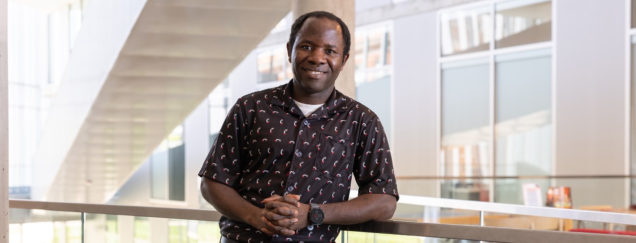 Portrait of Edson Chipalo, PhD, in Health Sciences Building atrium 