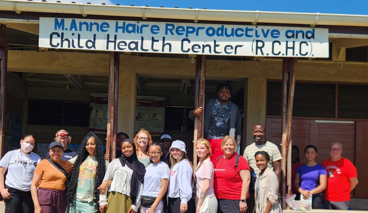 UC Leaders and student delegates working alongside 8 brilliant Marian Spencer Scholars at the M. Anne Haire Reproductive and Child Health Center.