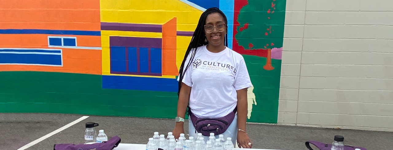 Brittany Knott hosting a table at a community event