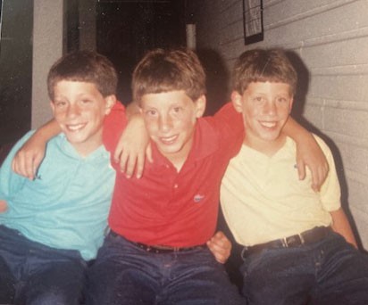 An old photo of the triplets as boys.