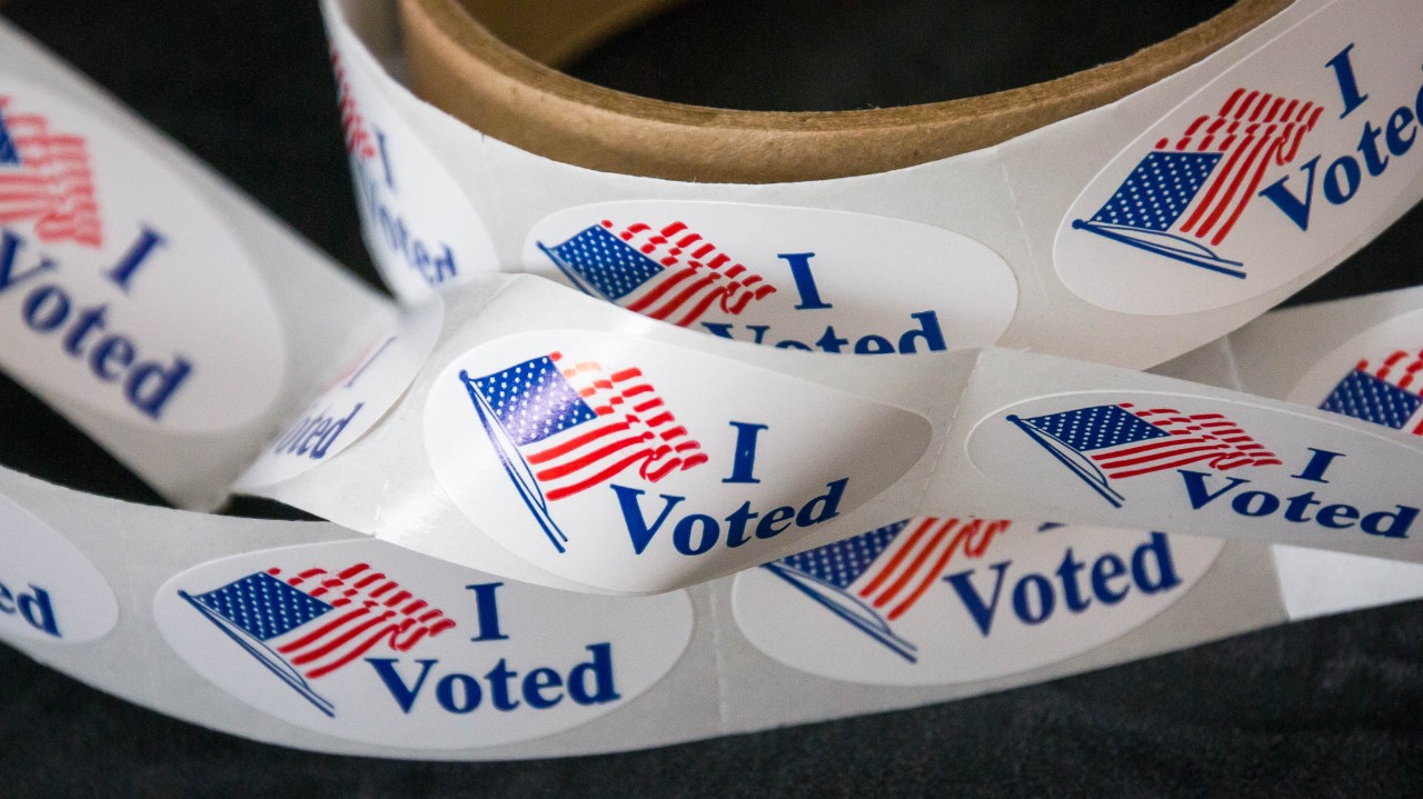 Election stickers bearing an American flag read, "I voted."