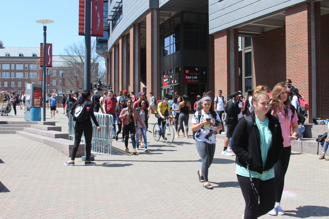 Students walking along MainStreet on UC's main campus 
